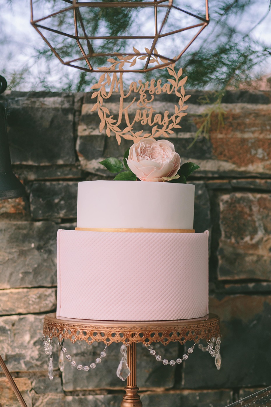 simple soft pink and gold wedding cake