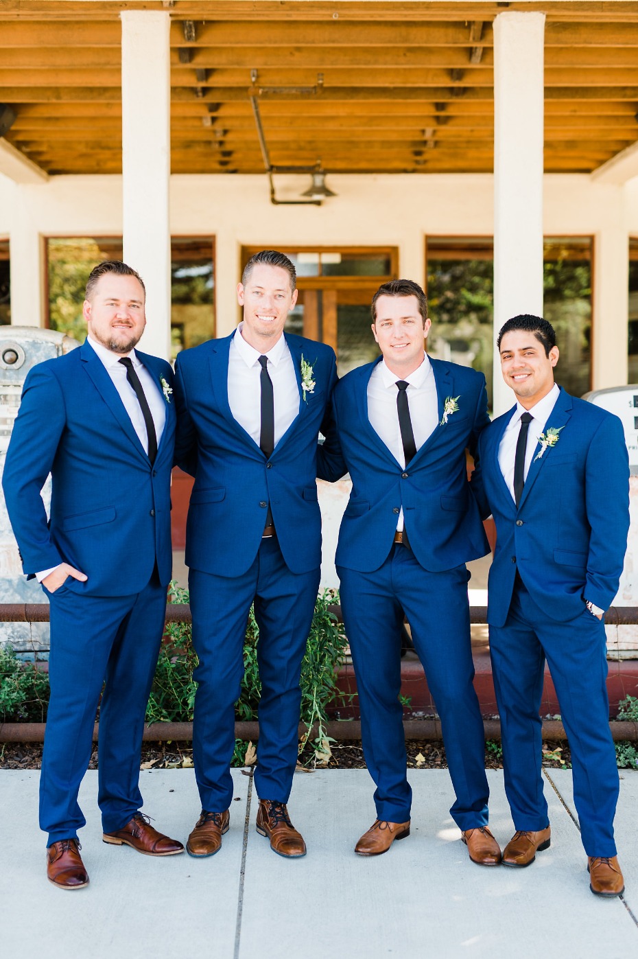 Groom and his men in navy suits