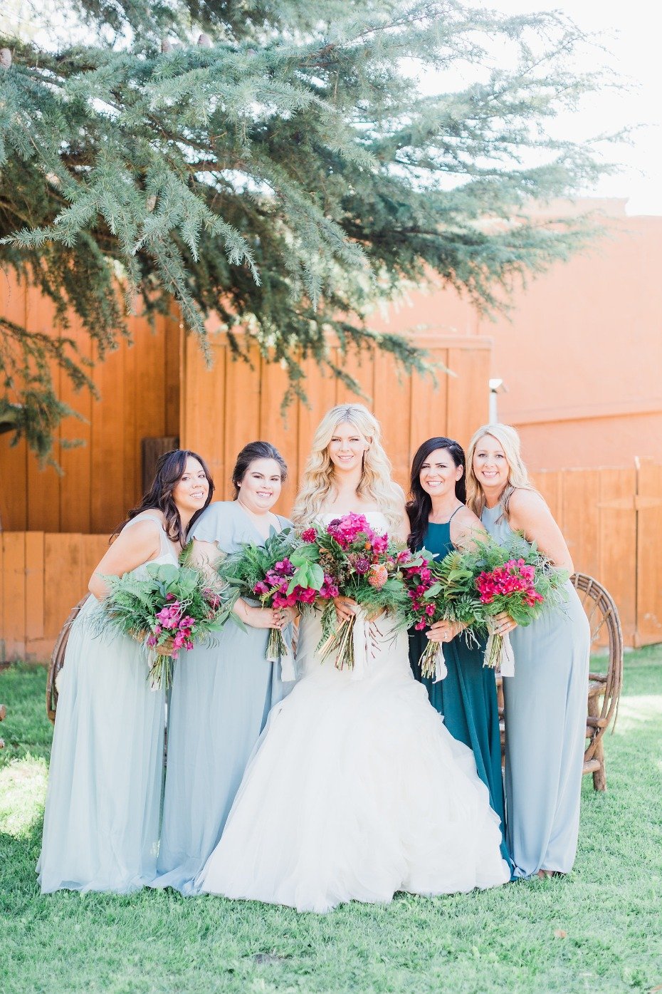 Mismatched bridesmaid dresses in blue