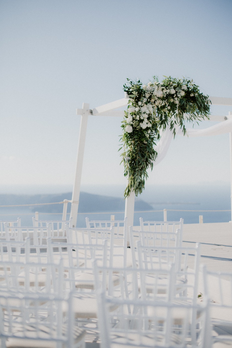 Simple wedding arch and greenery