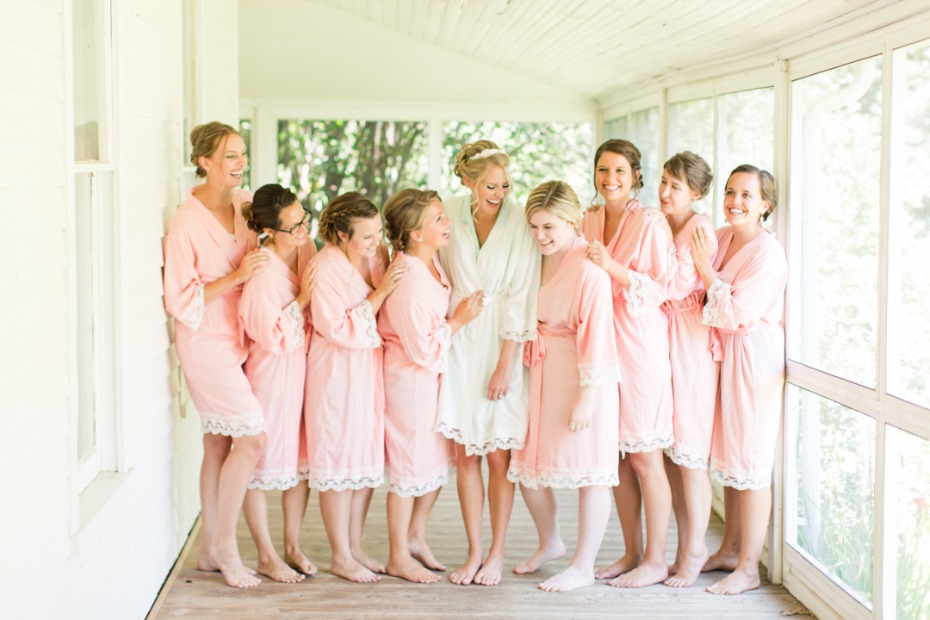 Bridesmaids in marching pink robes