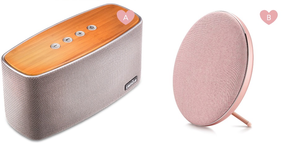 Stylish portable speakers with wooden top and pink speaker design
