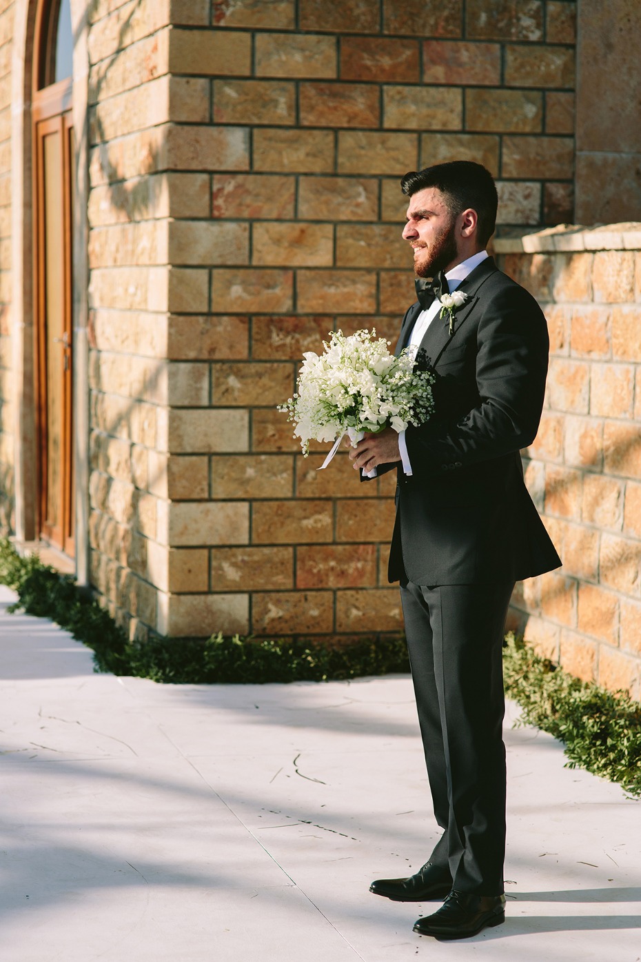 a groom waiting for his bride