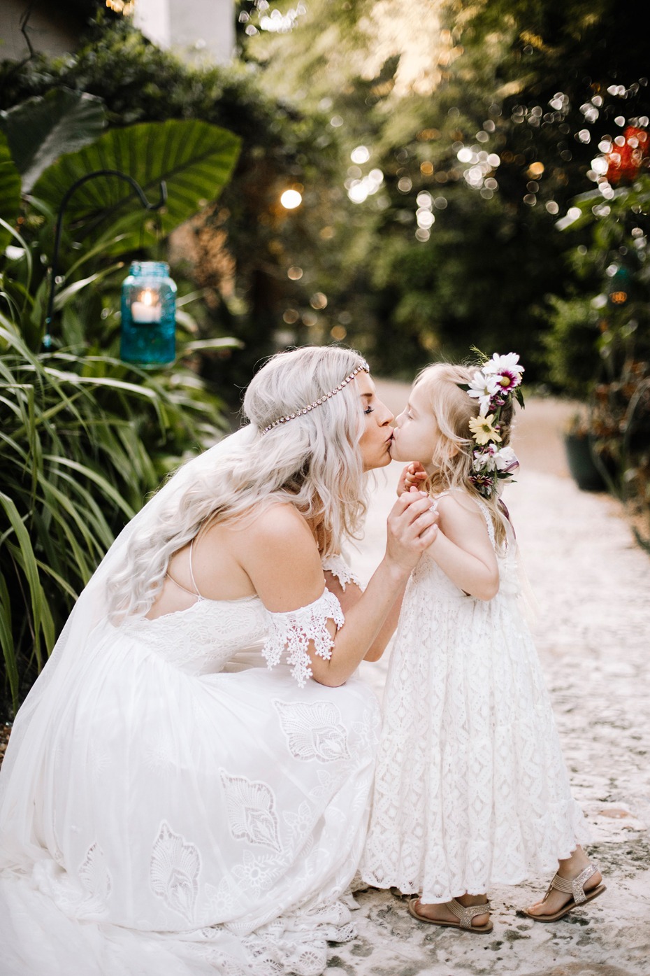 a bride and her flower girl