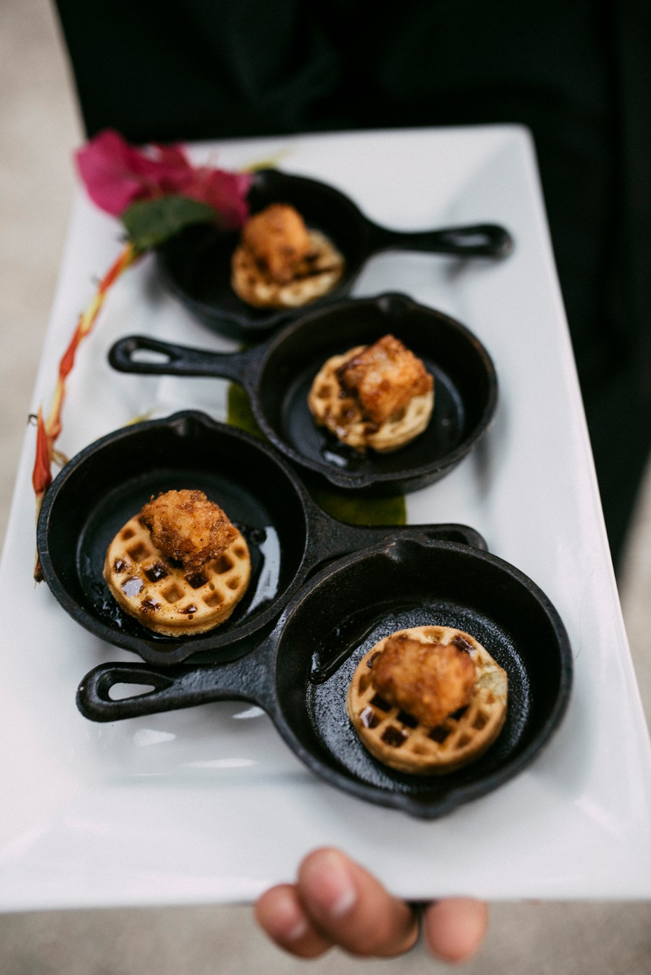 mini chicken and waffles in cast iron skillets