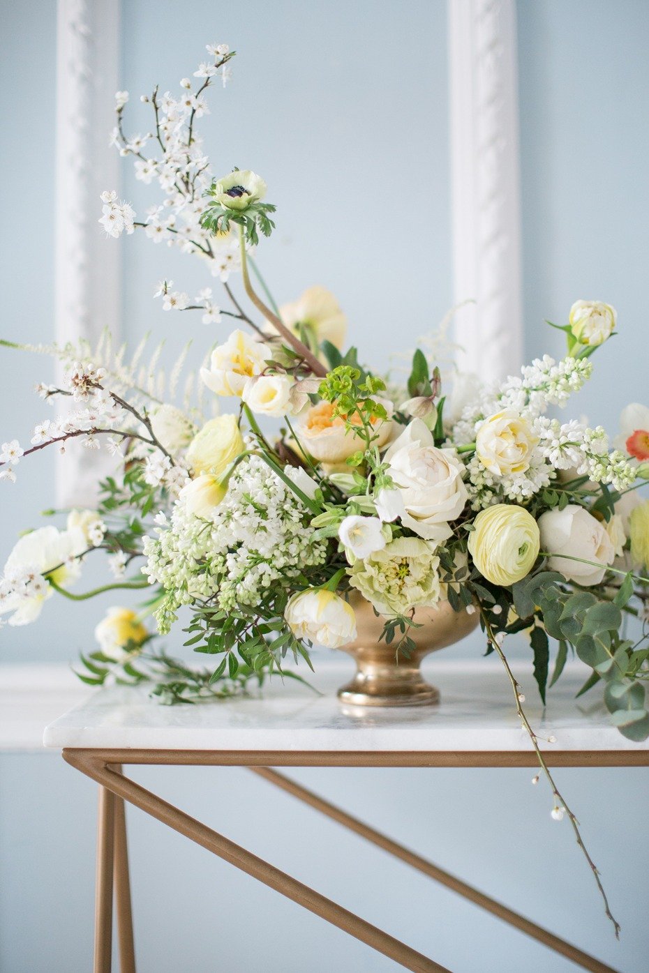 elegant white and yellow wedding floral arrangement