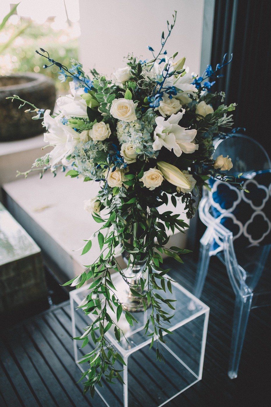 Blue and white ceremony florals