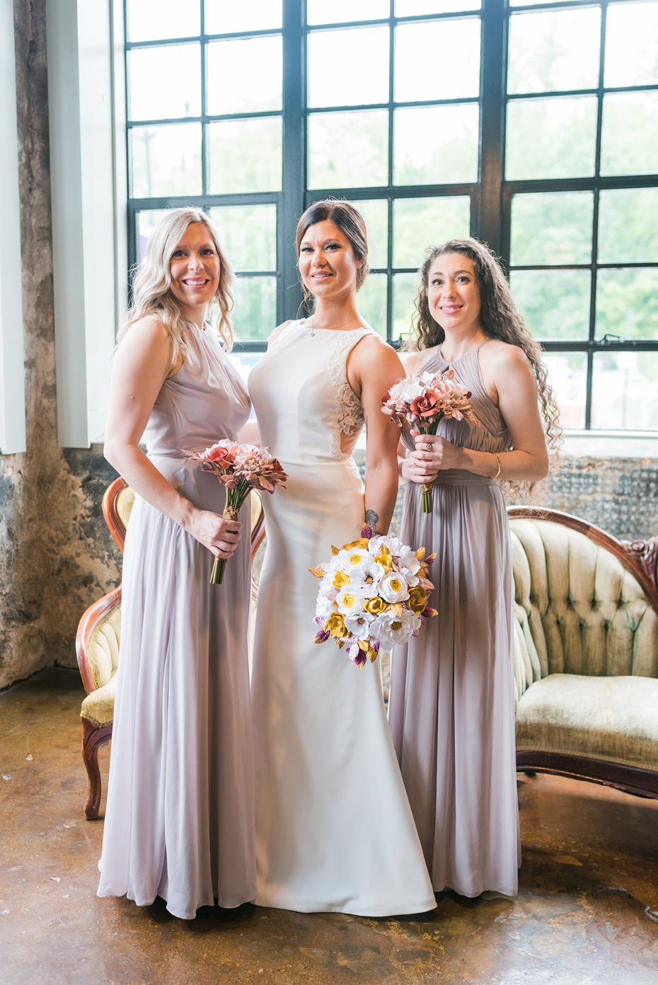 bridesmaids in soft purple dresses