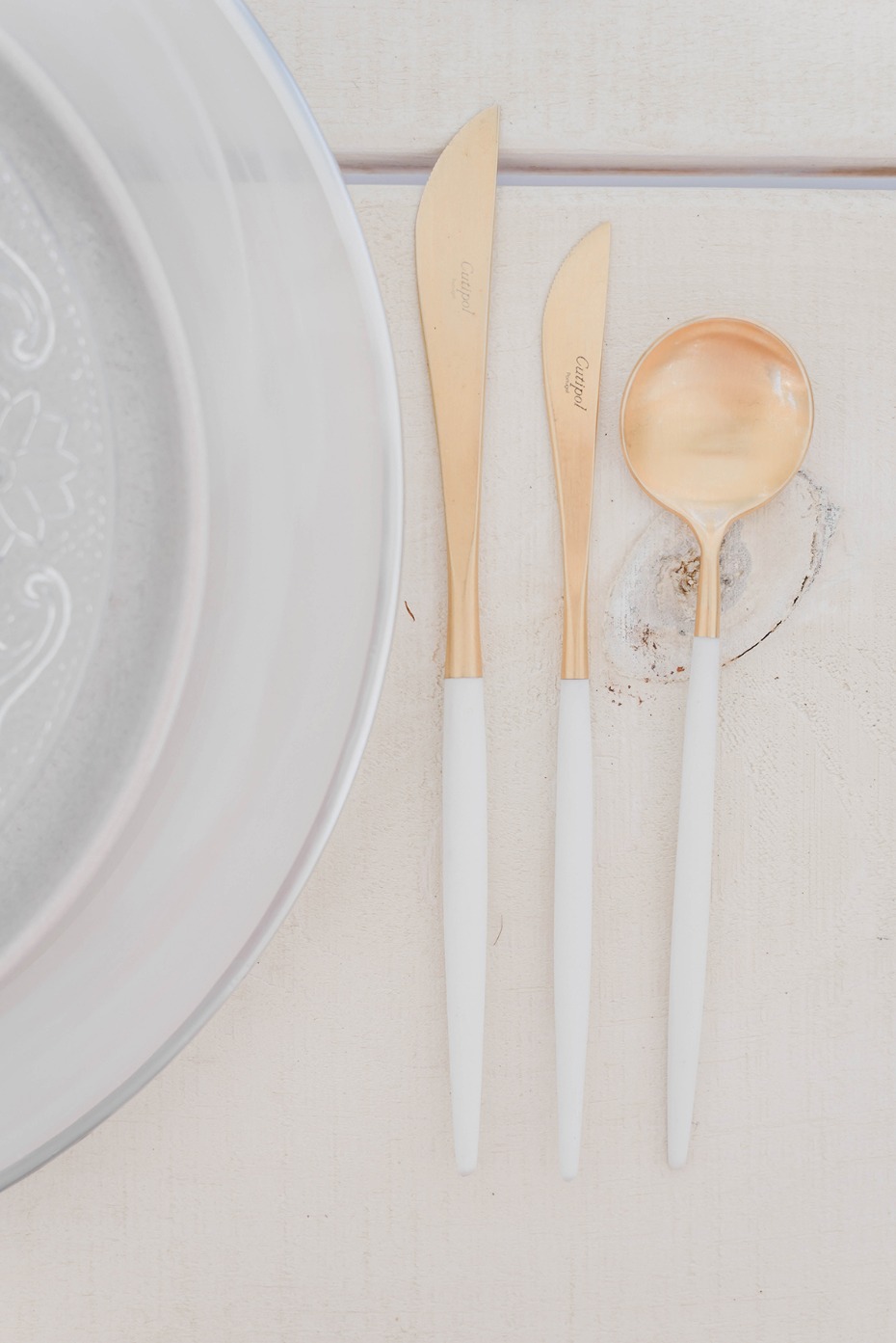 gold and white modern silverware
