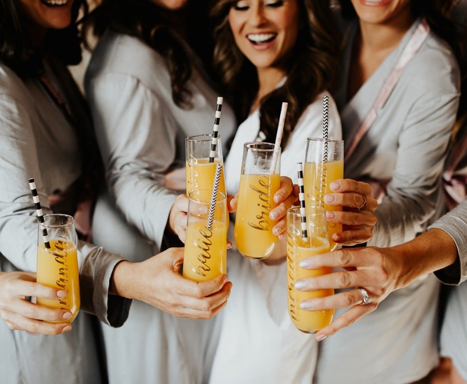 Cheers with the bride and bridesmaids