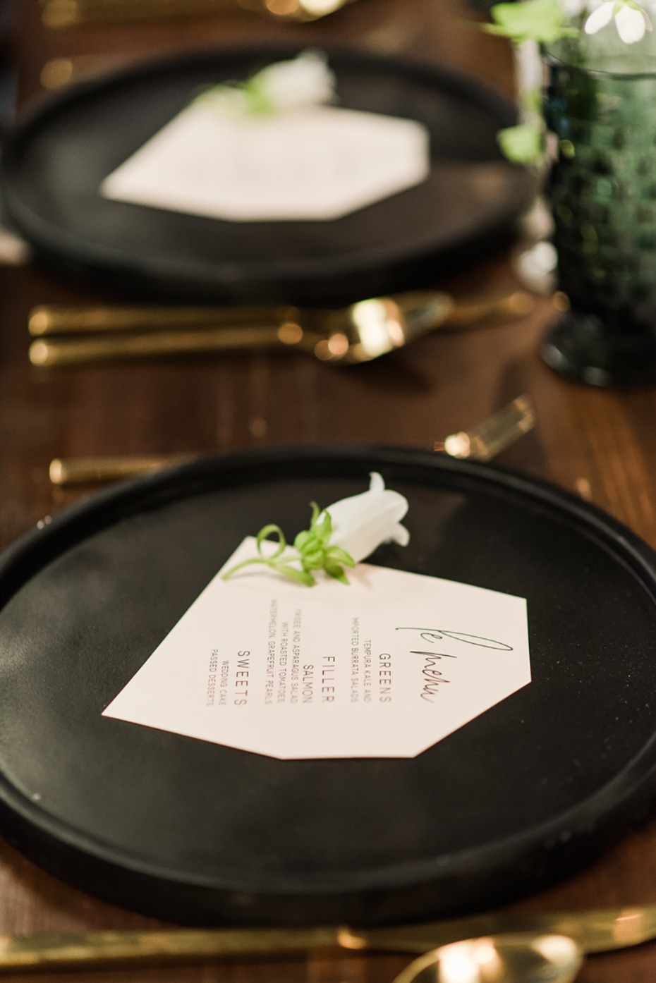black and gold table place setting