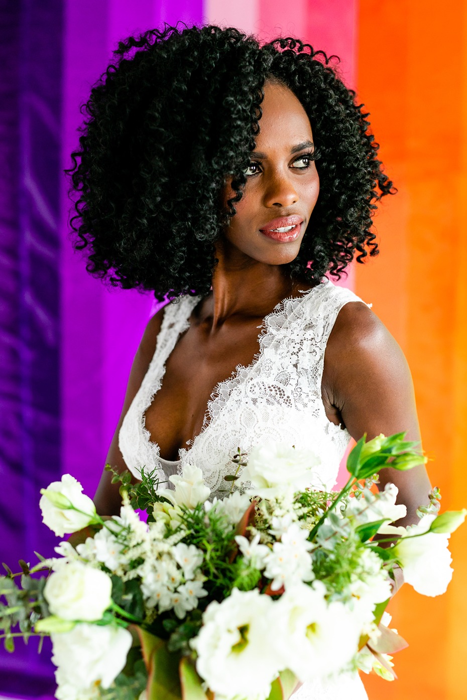 amazing bridal photo with fun rainbow background