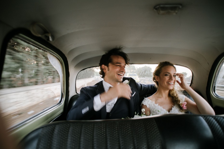 Just married couple in a vintage car