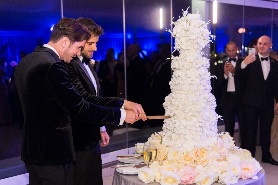 same sex wedding cutting the cake