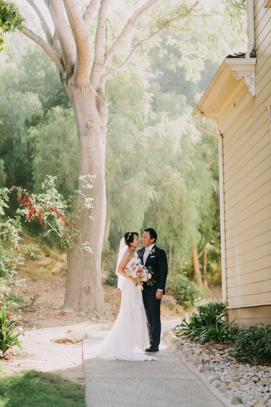 Bride and groom portrait on their wedding day outdoors