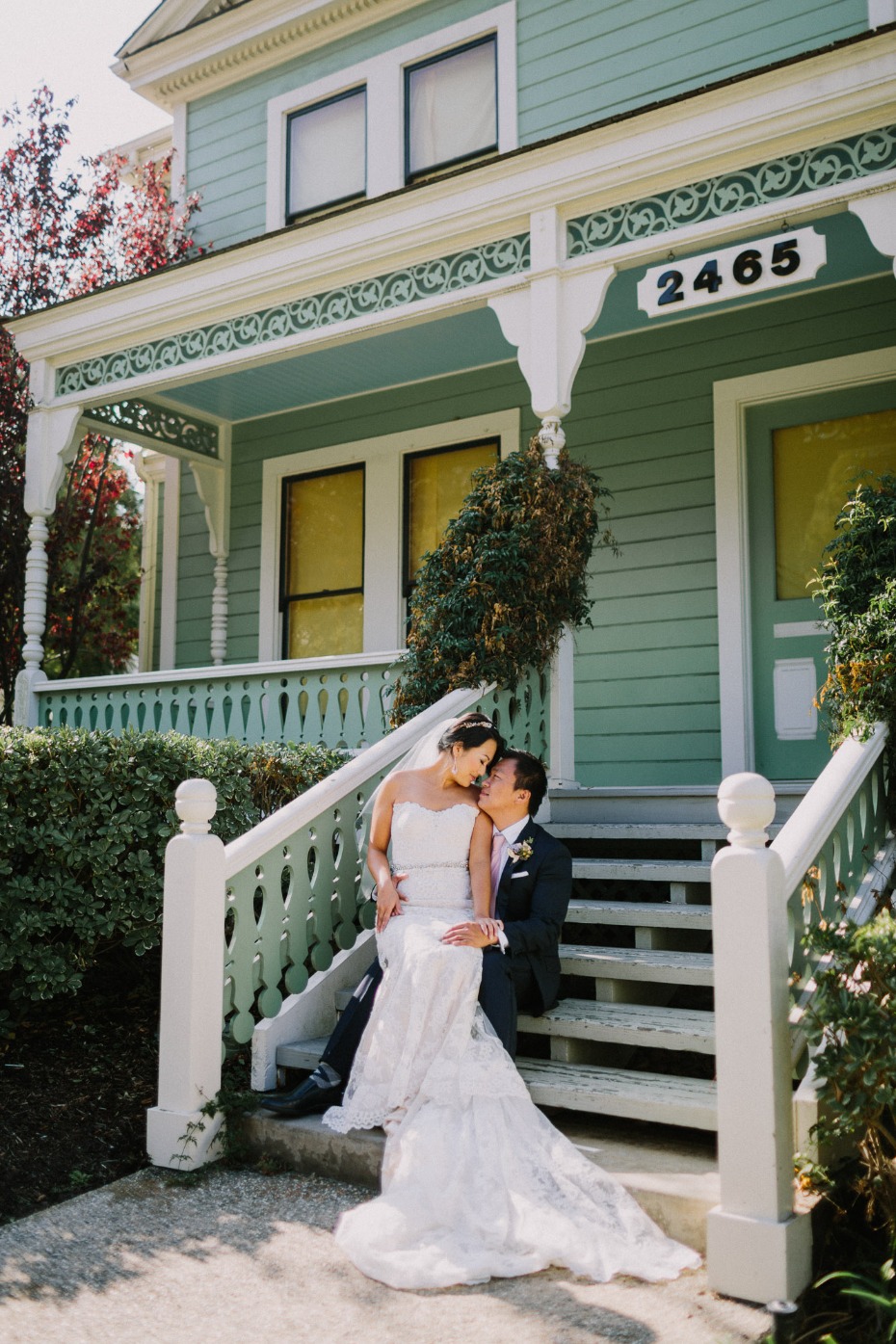 Newly wed couple sharing a tender moment on wedding day