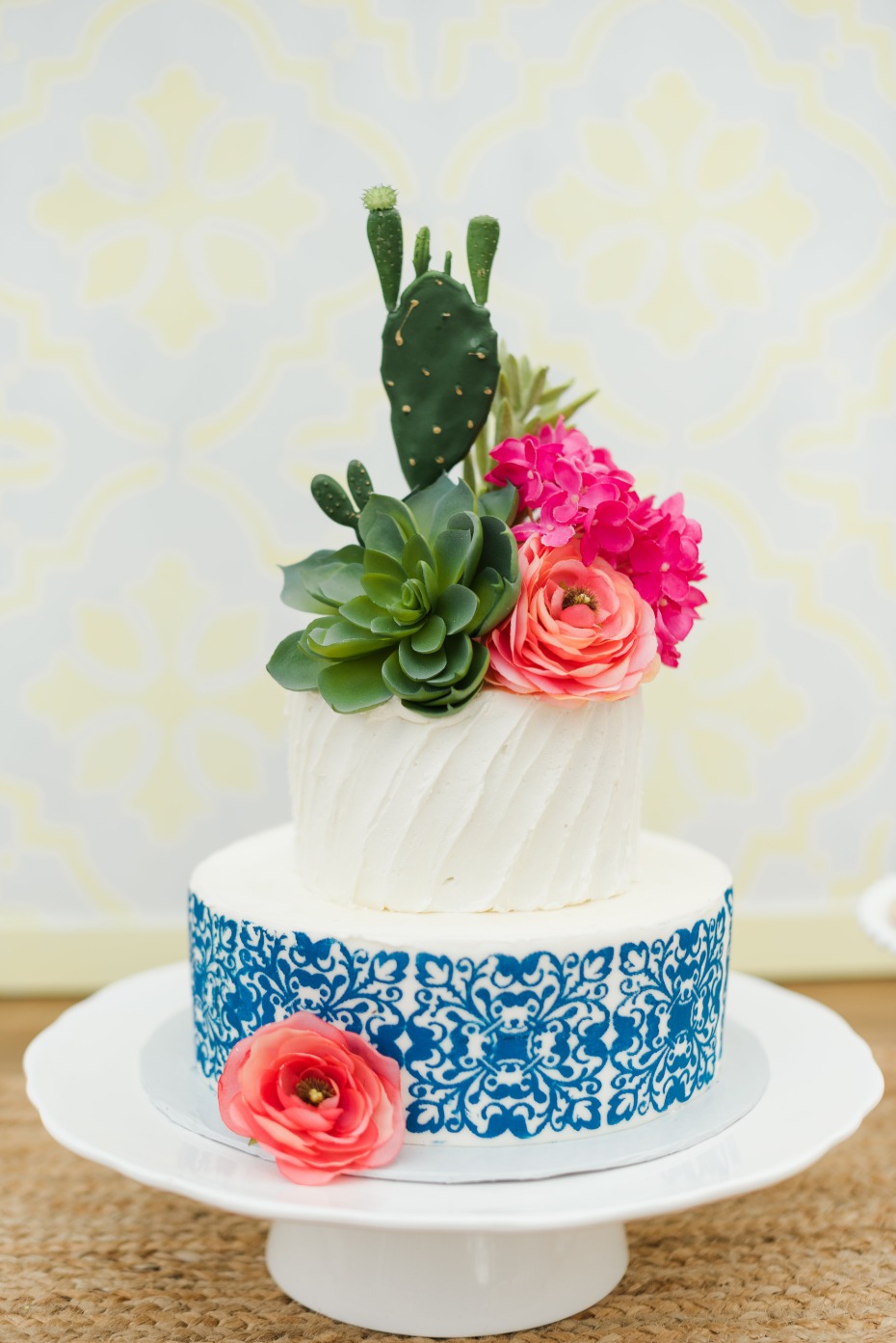 cactus and flower topped wedding cake