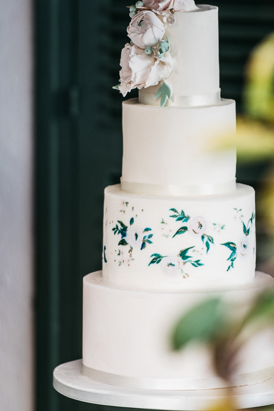 wedding cake with painted flowers