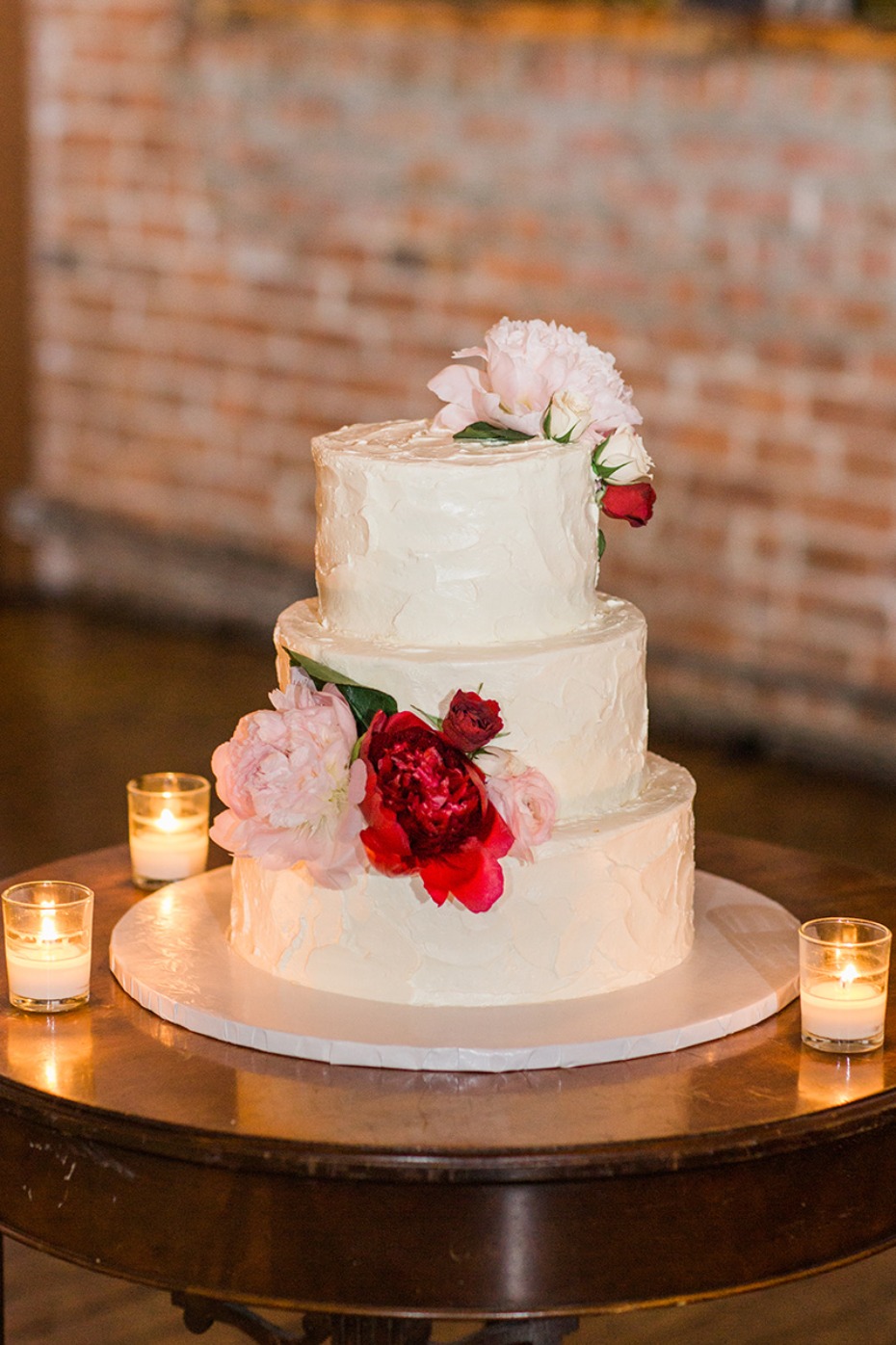 classic floral topped wedding cake
