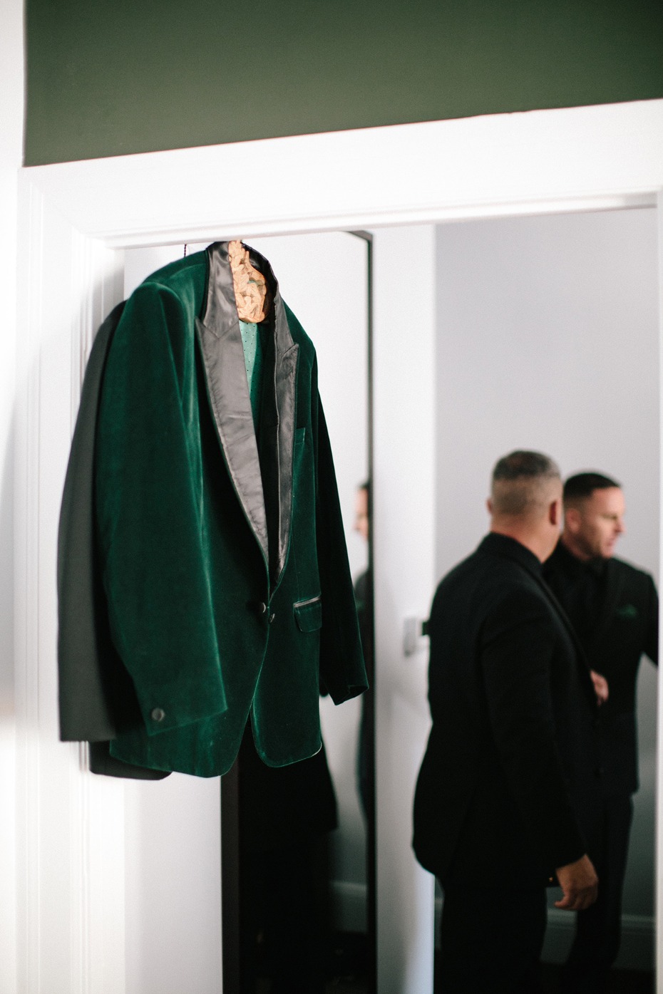 Emerald green groom jacket