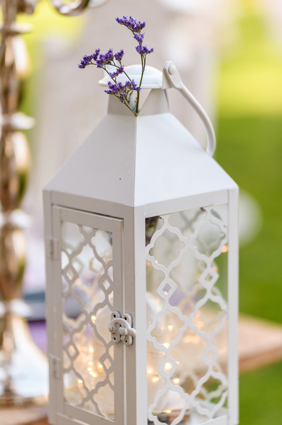 romantic white lantern with a sprig of lavender