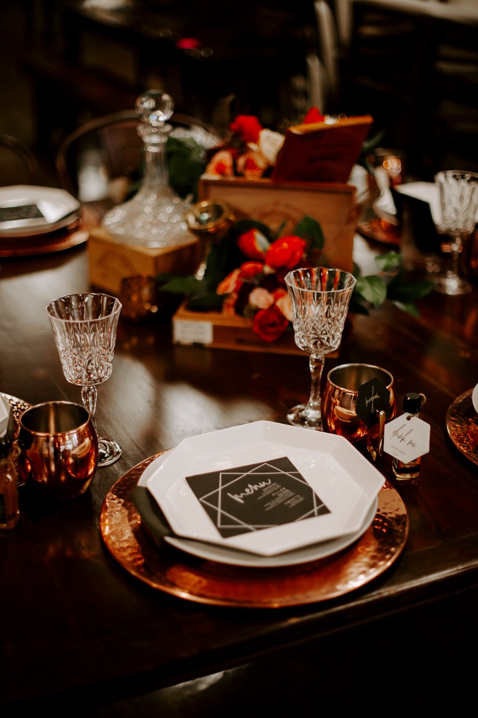 copper and black table setting