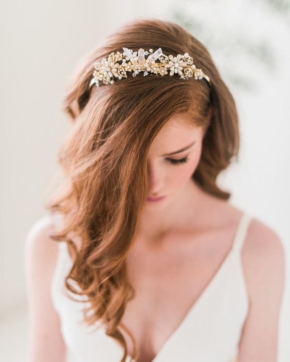 Redhead woman wearing floral bridal crown with crystals