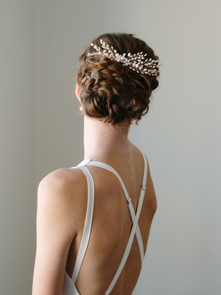 Bridal updo with pearl hairpiece and crisscross dress