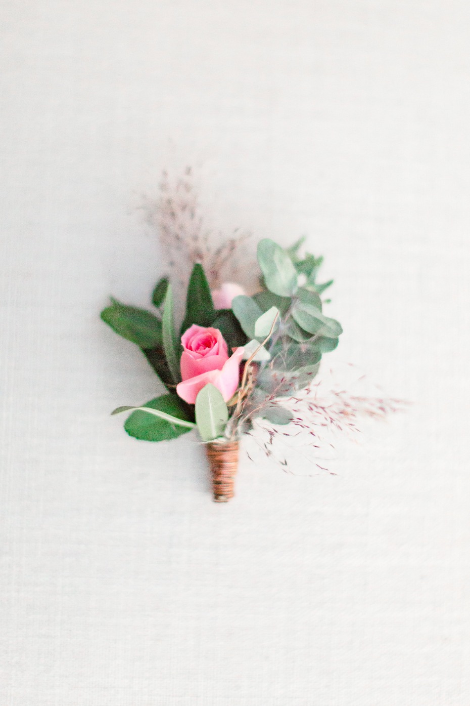Pink rose boutonniere