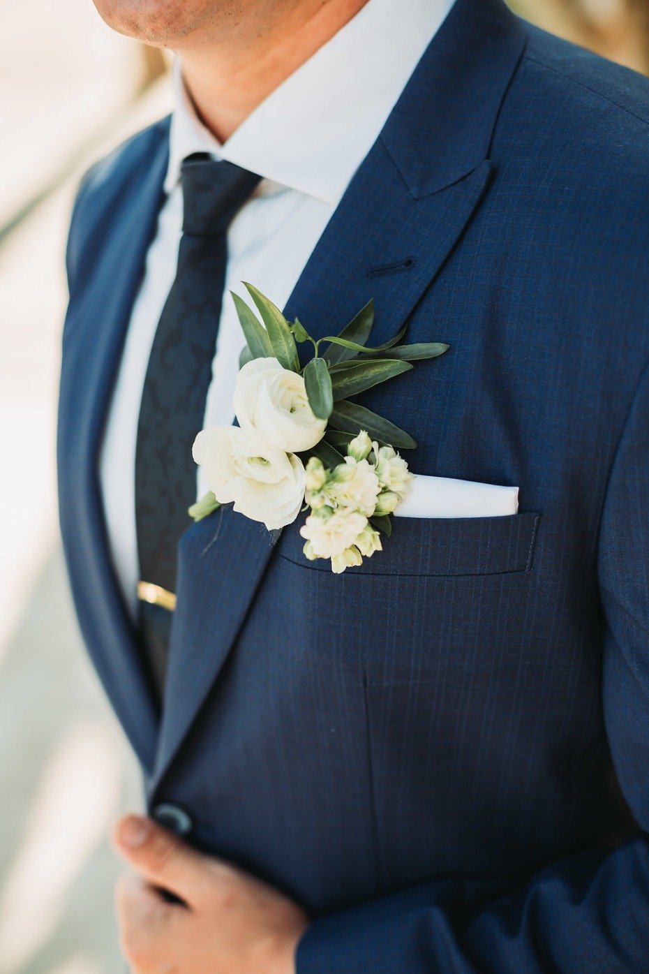 groom in navy suit