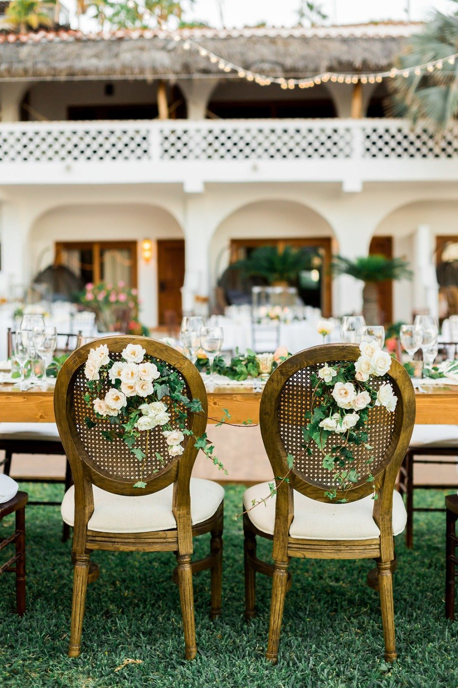 flower accented wedding chairs