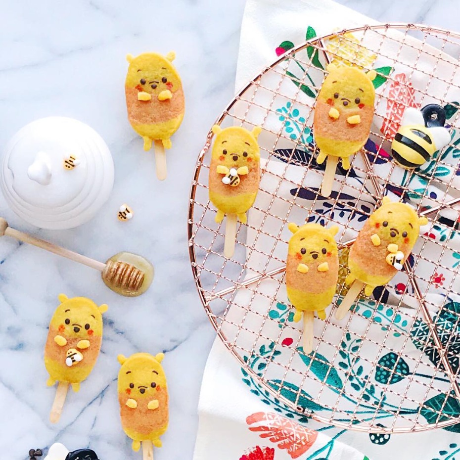 Adorable Winnie the Pooh popsicles on a cooling rack