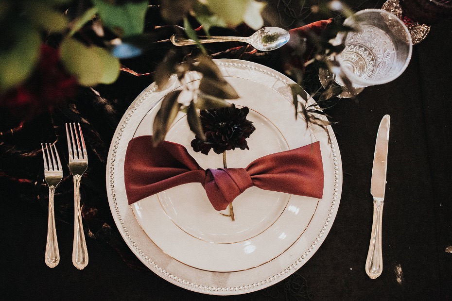 romantic and dark themed table setting