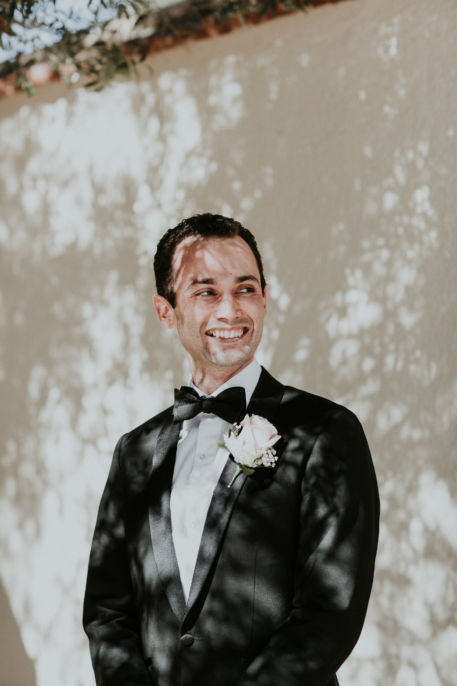 groom in black tie