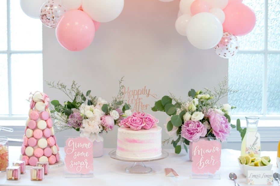 pink and white cake table for bridal shower