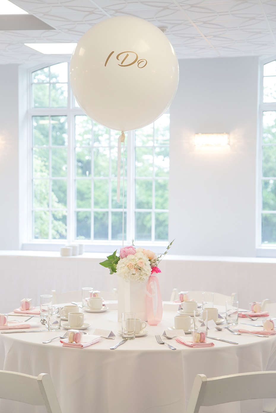 white and pink bridal shower with giant ballons