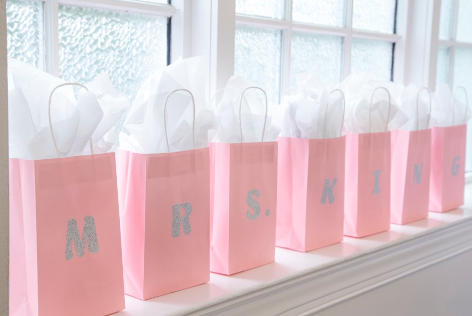 use pink bags with glitter initials
