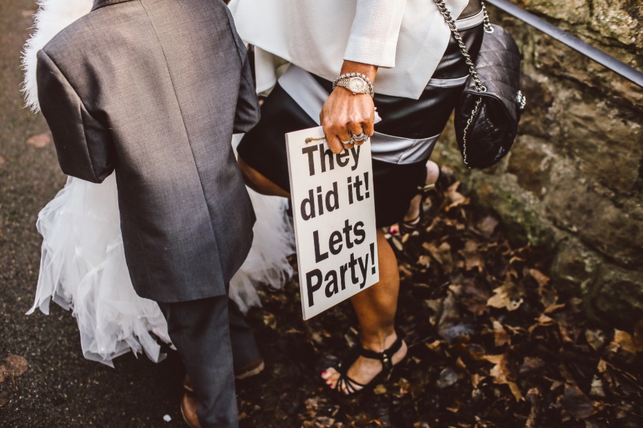 Celebrating success sign reads They did it Lets Party