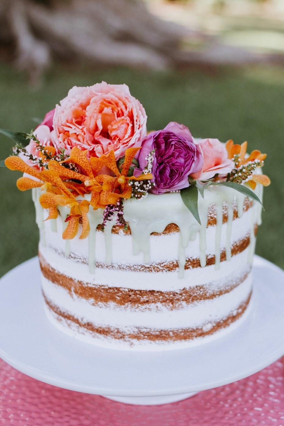 nearly naked drizzle tropical themed wedding cake