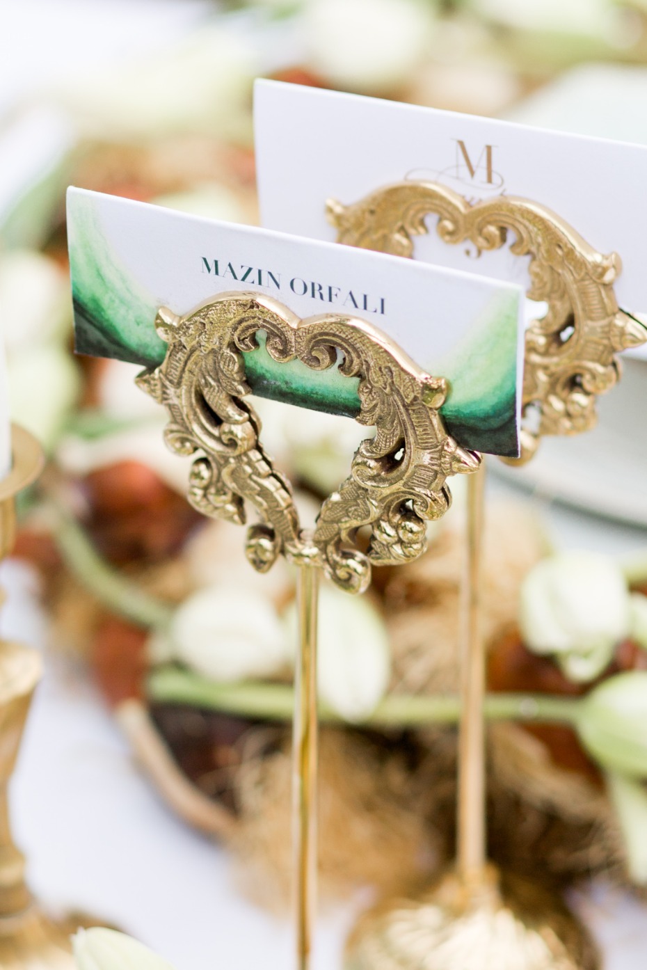 Elegant heart-shaped place card holders add a touch of luxury