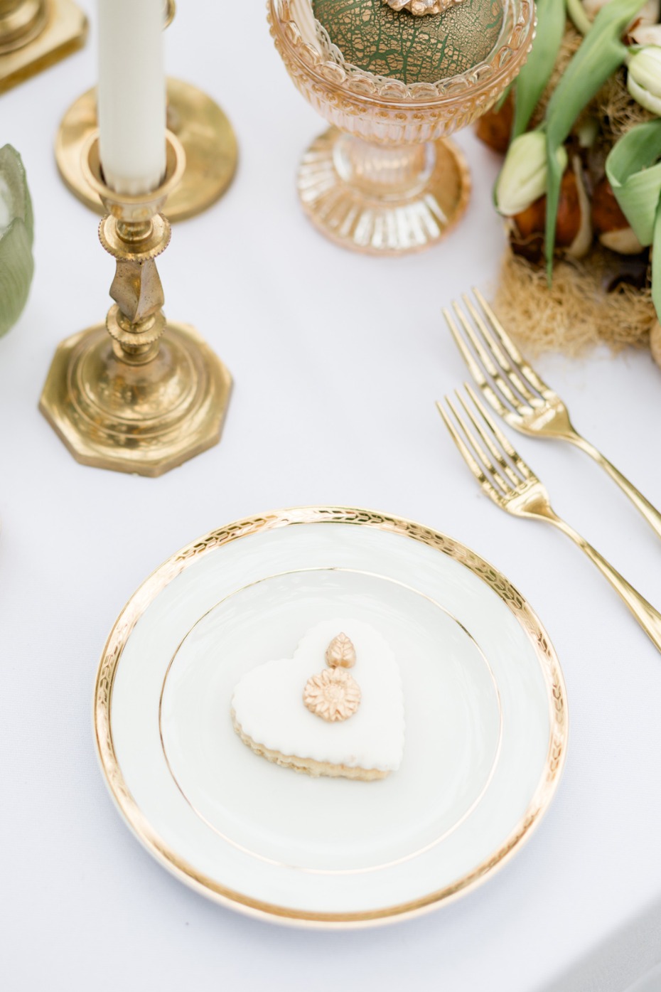 Gold-rimmed plates for a wedding