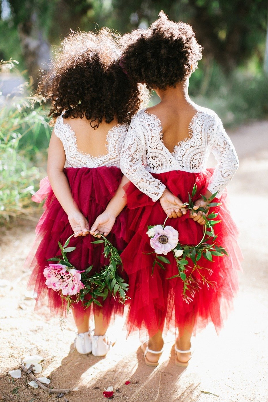 Cute little flower girls with simple hoop bouquet