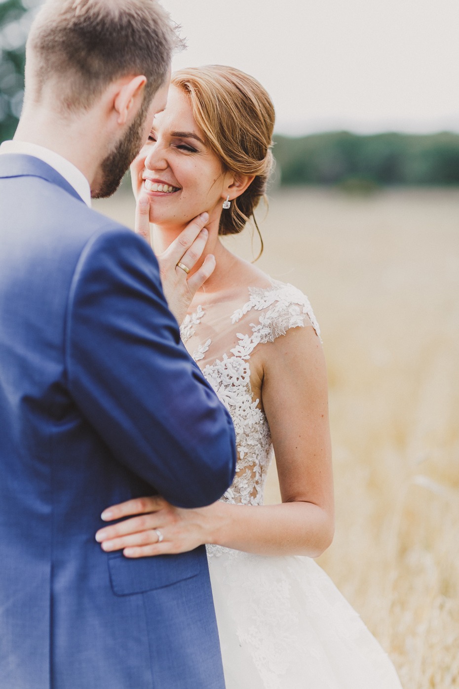 Bride and groom sharing a tender moment at their wedding