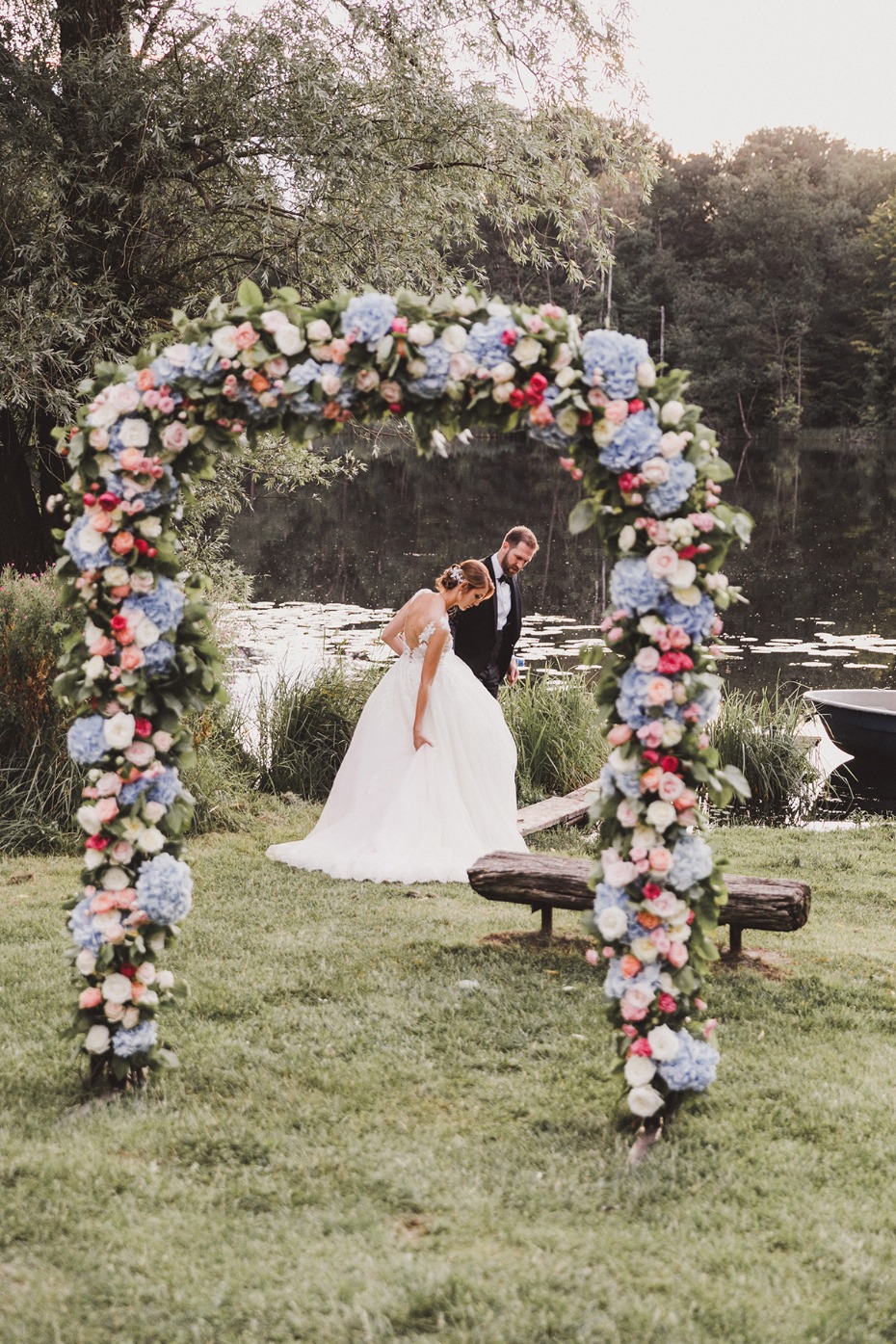 blue and pink floral wedding arch