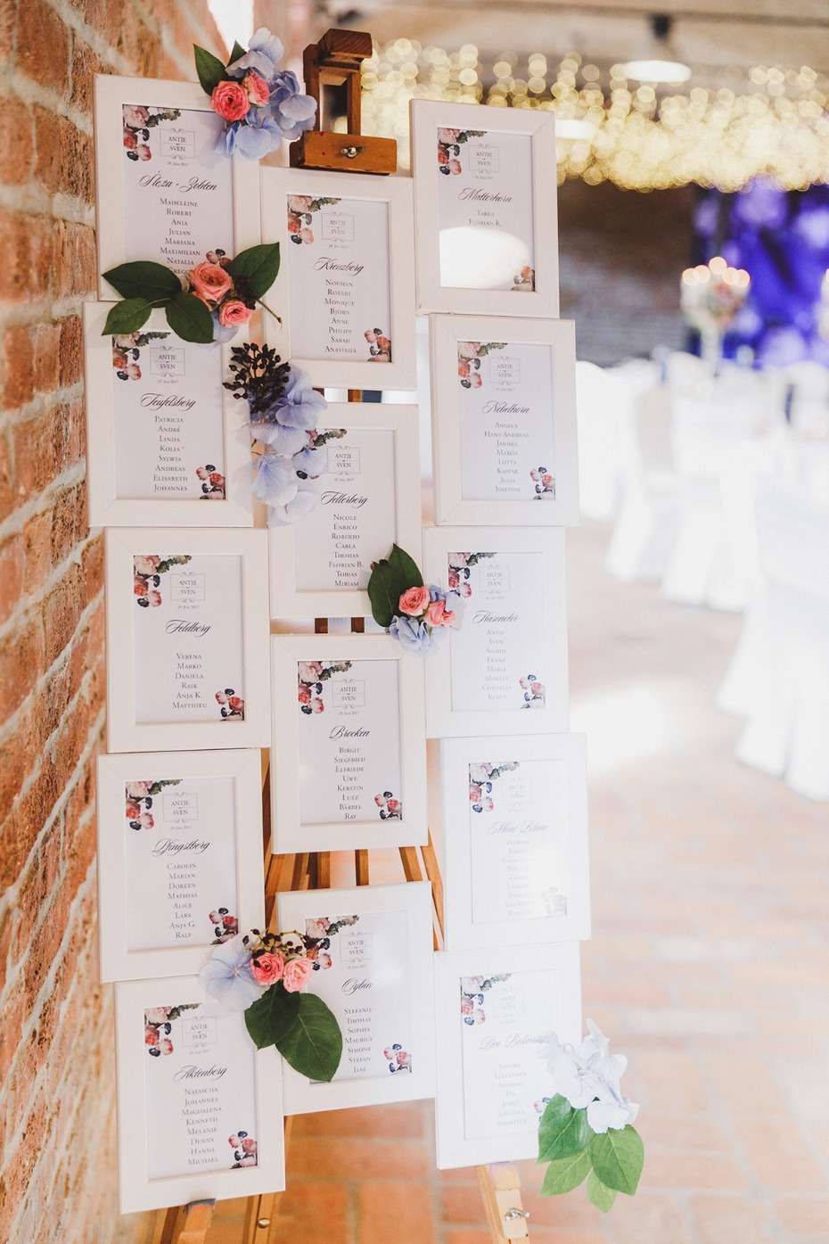 Wedding seating chart decorated with flowers and frames