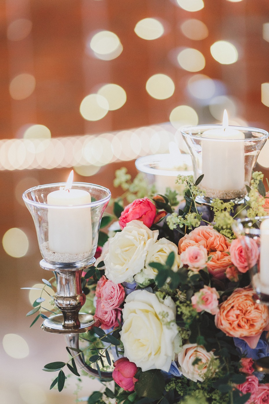 Candles and flower arrangement for a romantic wedding decoration