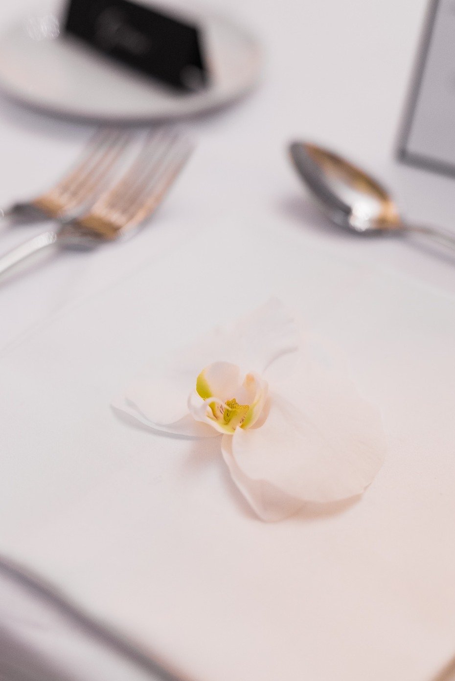 Orchid place setting for a wedding