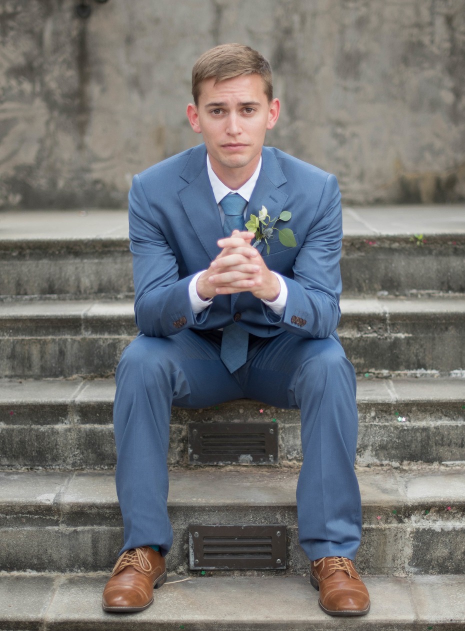groom in blue suit