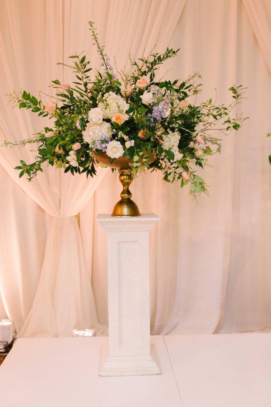 elegant wedding ceremony backdrop florals