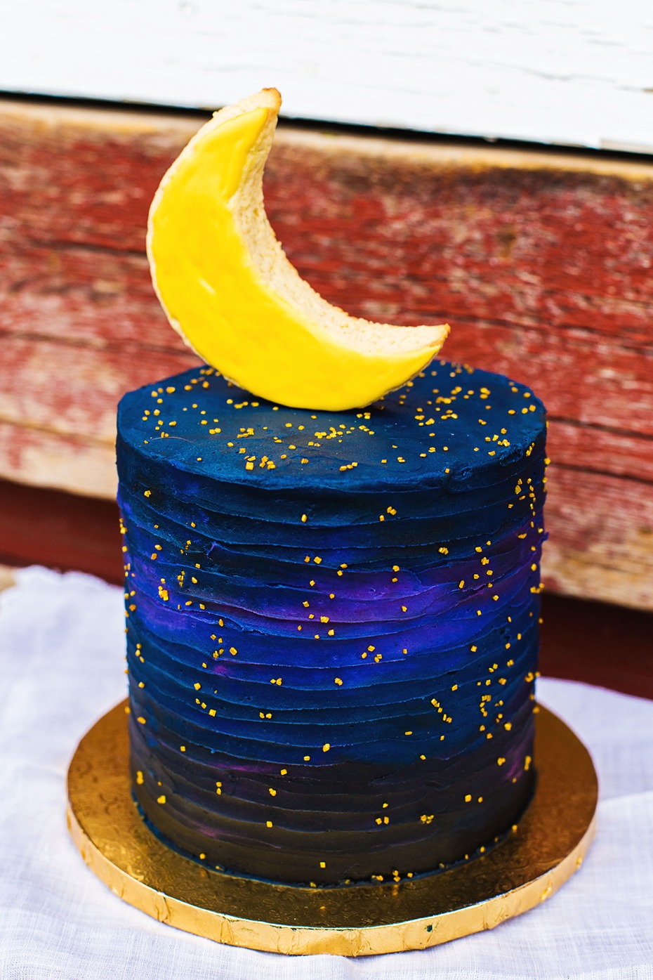 galaxy wedding cake with moon topper